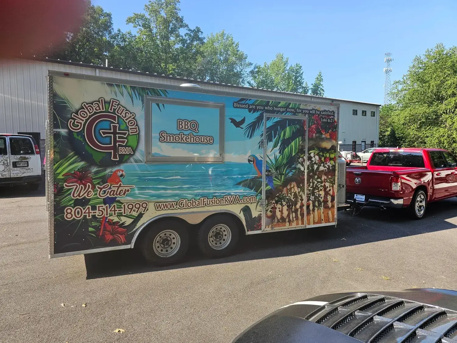 Global Fusion RVA's food truck and trailer, fully wrapped in tropical branding, parked and ready for an event